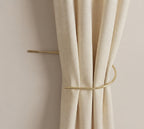 Unlacquered solid brass crescent curtain holdback, wall-mounted drapery tieback